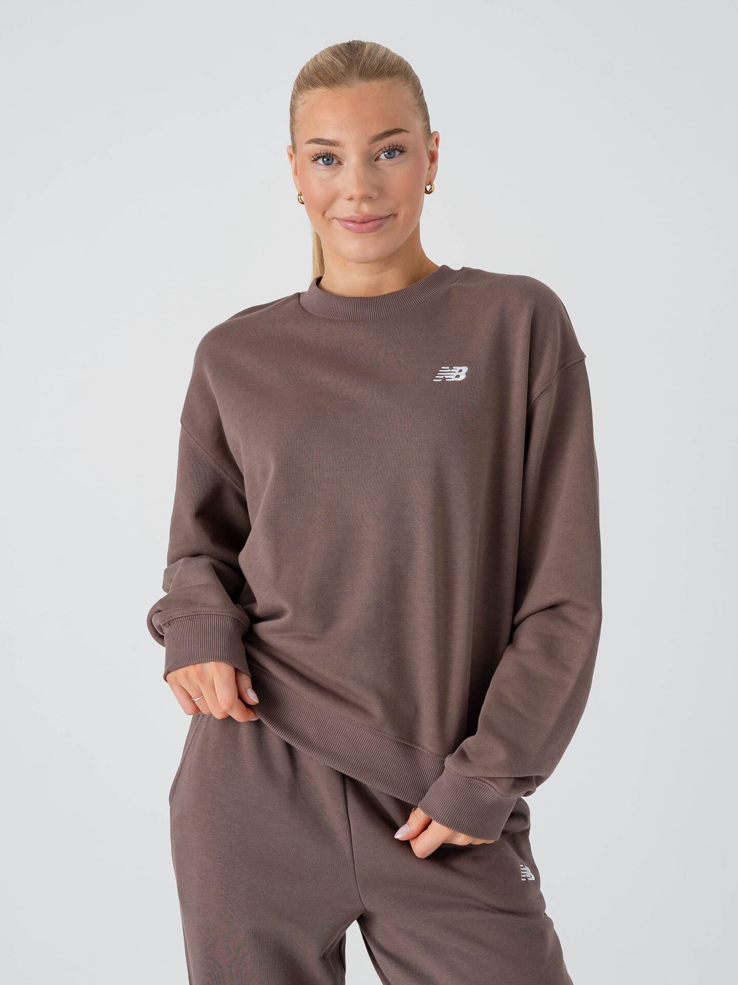 New Balance Sport Essentials French Terry Crew Cortado